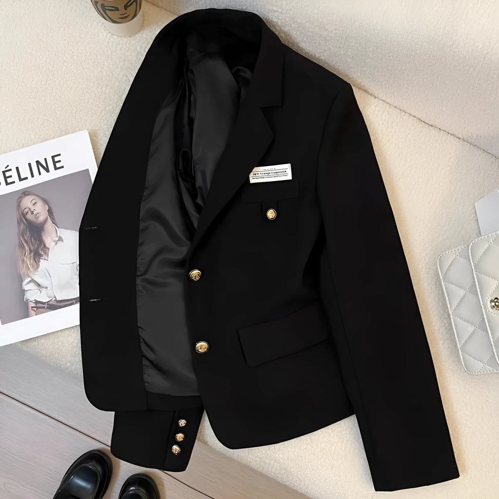 Black women's loose fit short suit coat with front pockets and regular long sleeves