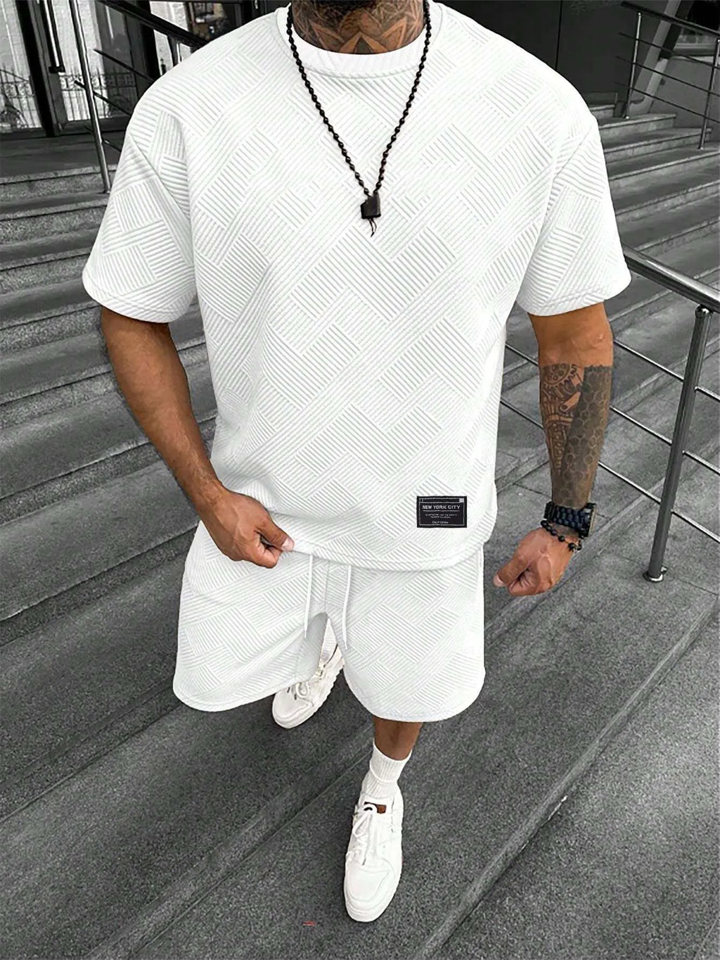Men's short sleeve top and shorts leisure suit set in chemical fibre blend fabric
