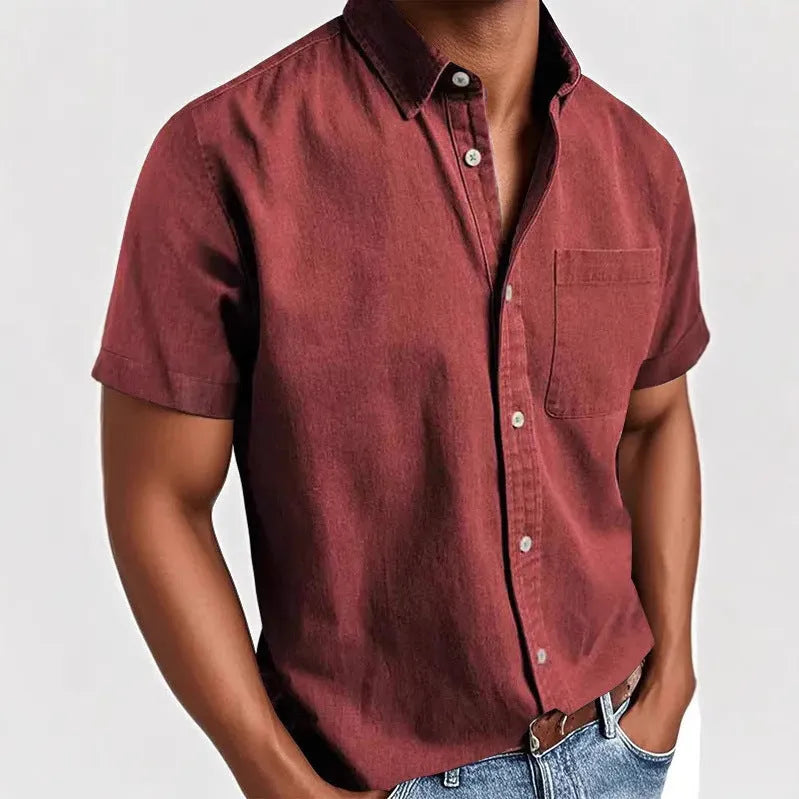 Men's solid colour short-sleeved polo shirt with a chest pocket on a hanger