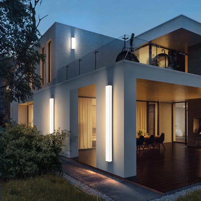 Long 60cm IP65 waterproof outdoor wall light in stainless steel and PC with warm white LED.