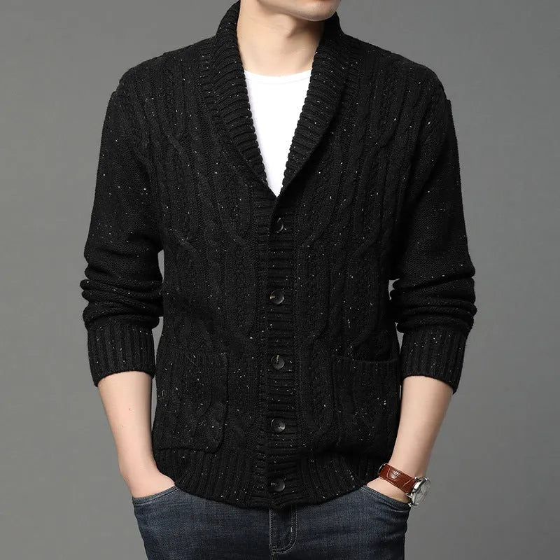 Man wearing a black Korean-style jacquard patterned knitted cardigan jacket.