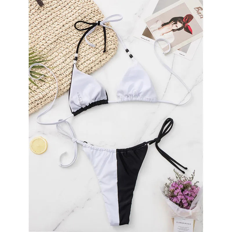 Women's black and white lace-up triangle cup bikini swimsuit with briefs bottom