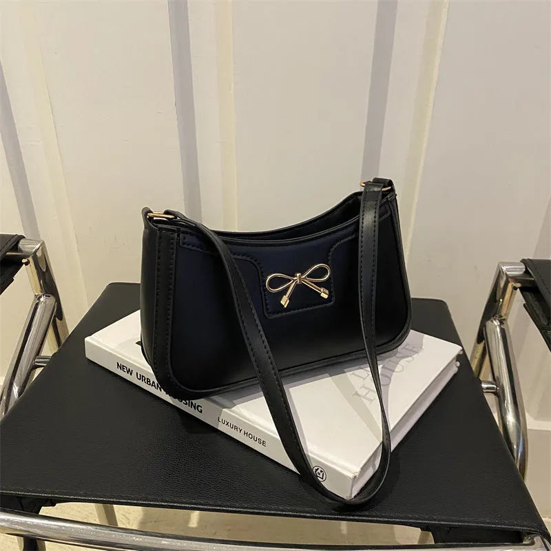 PU leather Western style baguette shoulder bag with bow detailing in six colour options
