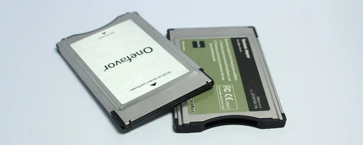 Stainless steel SD to PCMCIA adapter card with 32GB SD card for Mercedes-Benz car systems.