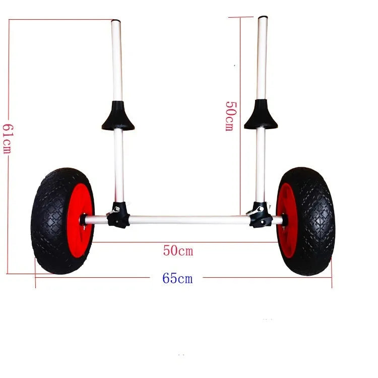 Foldable aluminium kayak cart with solid rubber tyres and black securing straps on a sandy beach.