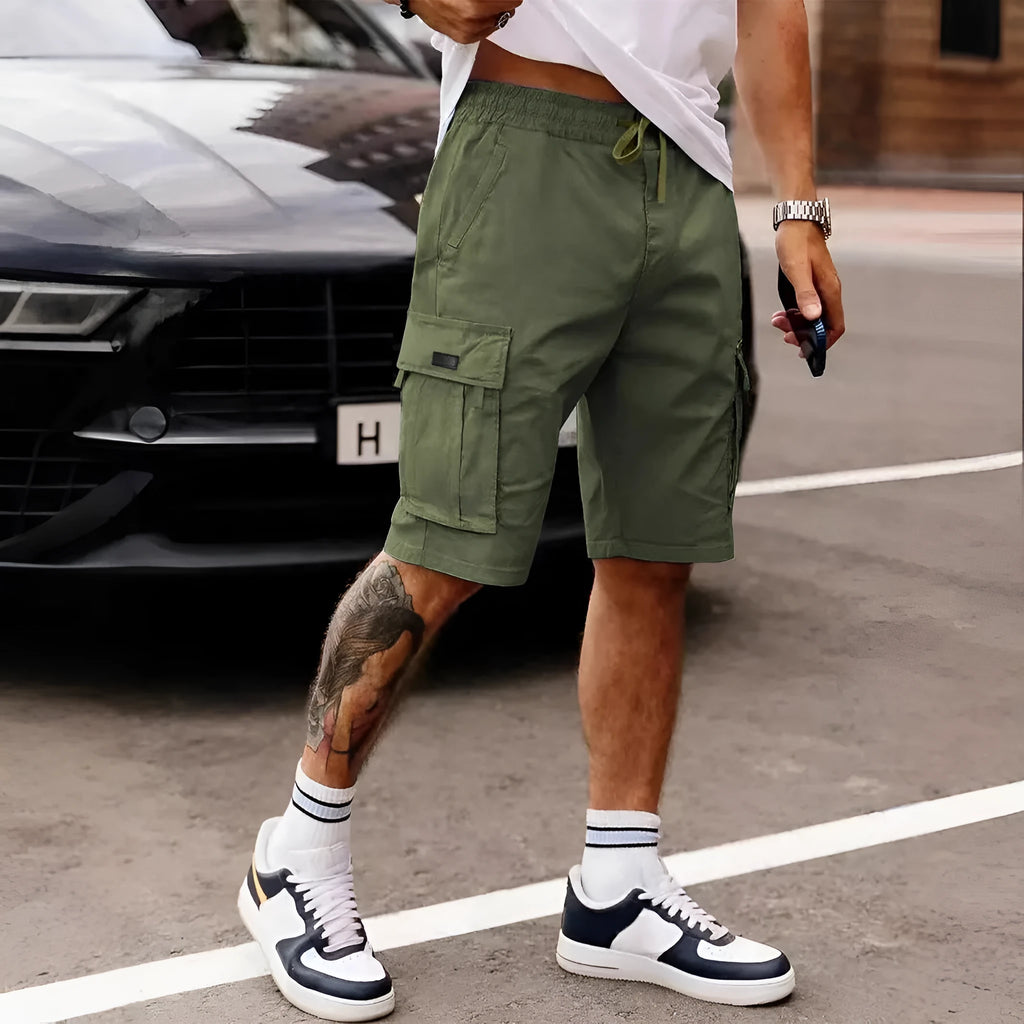 Men's loose fit straight leg cropped workwear shorts in light grey on a mannequin