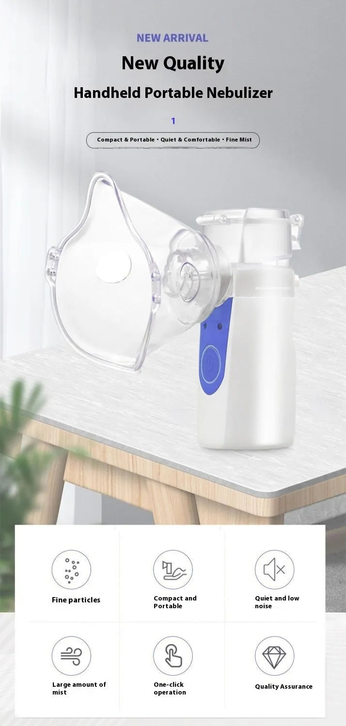 White columnar handheld USB nebuliser spray machine on a table with data cable.