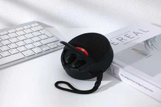 TG808 outdoor Bluetooth speaker with headset in black, showing horn and controls