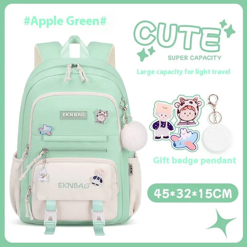 Pink waterproof Oxford cloth school backpack for girls with curved shoulder straps.