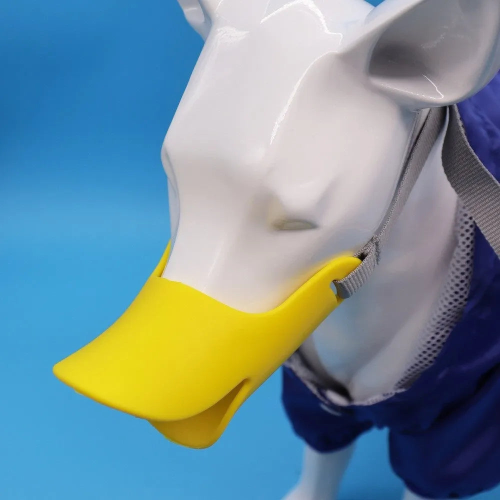 Blue TPR dog duckbill muzzle mouth cover for small to medium dogs, side view on light background