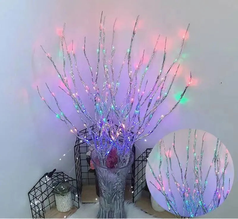 Silver branch LED decorative tree lamp with colour-changing lights in a vase base.