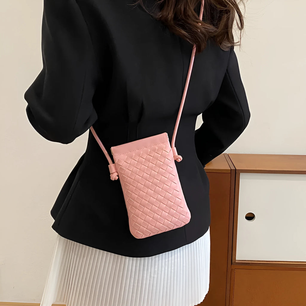 Vintage weave crossbody bag in vertical square shape showing European retro styling and dark cell internal compartment