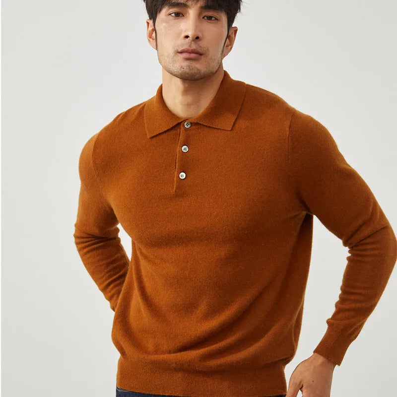 Man wearing a sapphire blue short sleeve cashmere pullover with a polo collar.