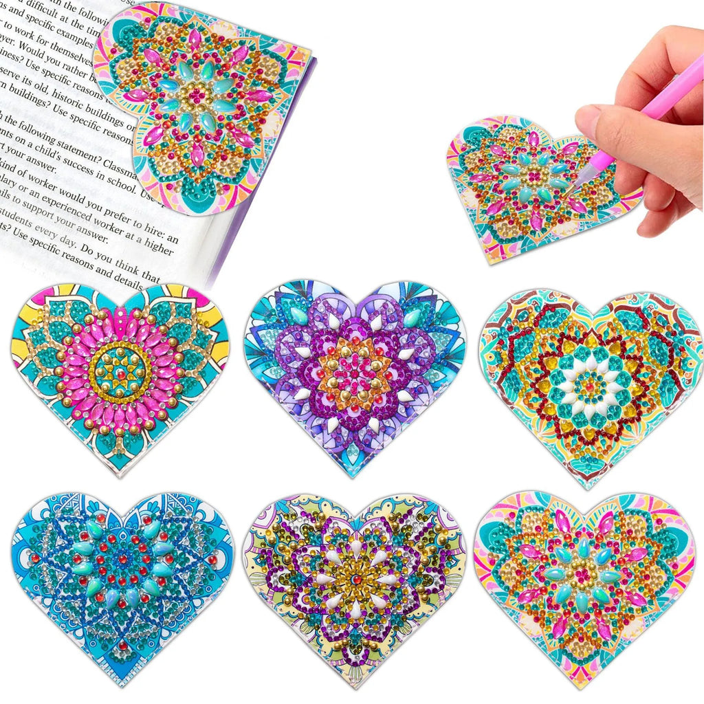 Six handmade PU leather bookmarks with crystal flower cornerite designs on a surface.