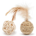 Two cat toy balls: one rattan ball and one faux feather ball with bell on a plain background.