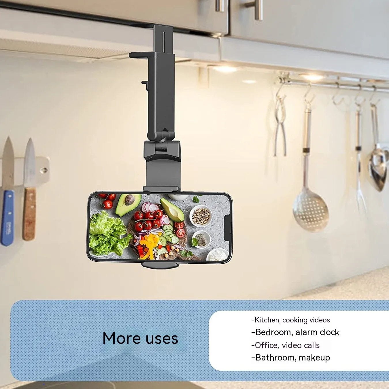 A foldable black phone holder with a rotating head, shown holding a smartphone.