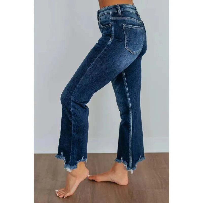 Solid colour women's denim trousers with a hand-worn finish in dark blue and light blue.