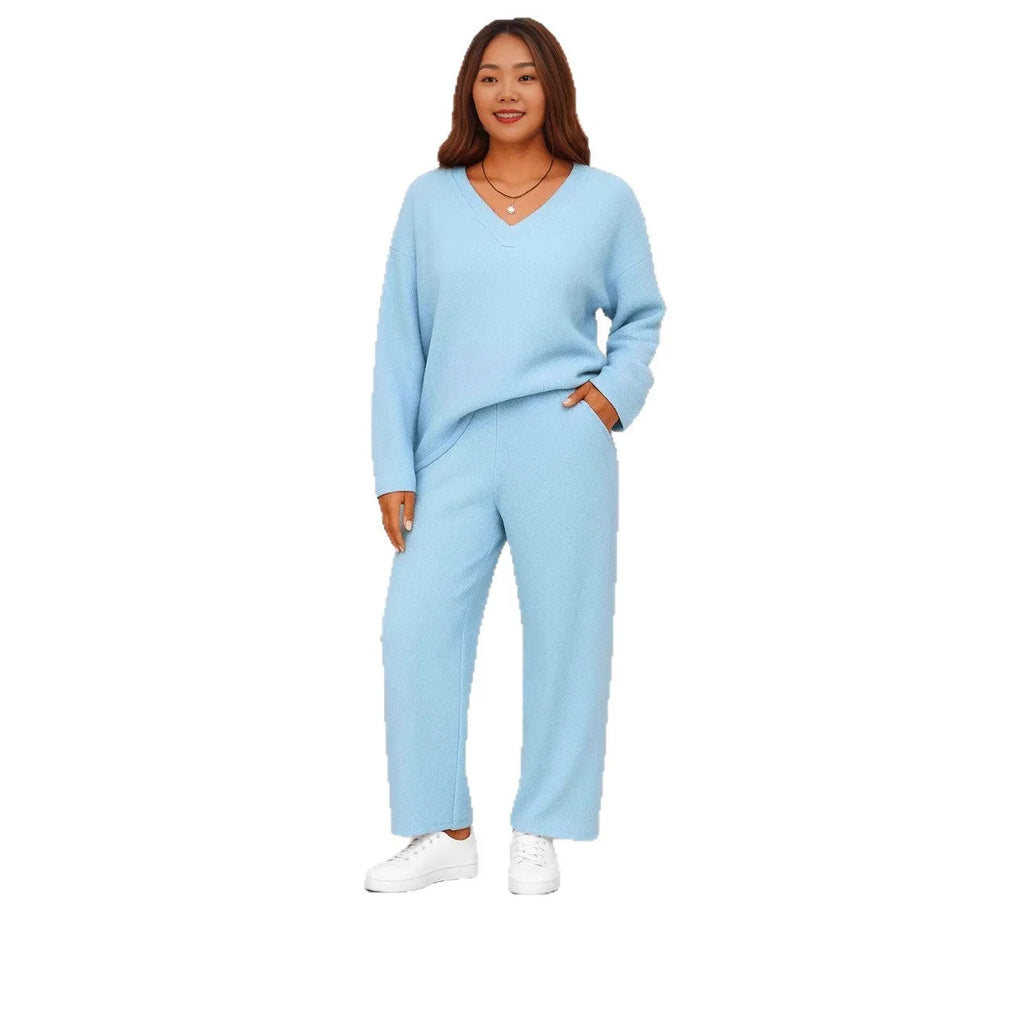 V-neck two-piece pajama set with long sleeves and pocketed trousers in solid colours, sizes S to 4XL