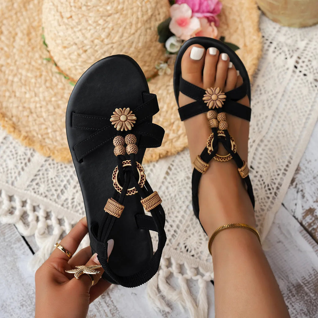 Black ethnic-style women's flat beach sandals with beaded weave decoration and open toe design