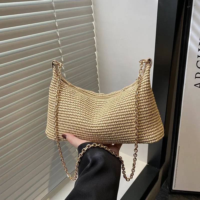 Woven straw crossbody handbag in horizontal square shape with phone compartment