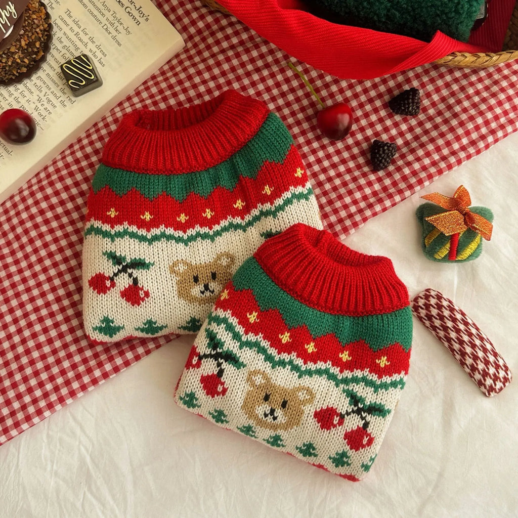 Red Christmas cherry print knitted sweater for a small dog or cat, shown in size L.