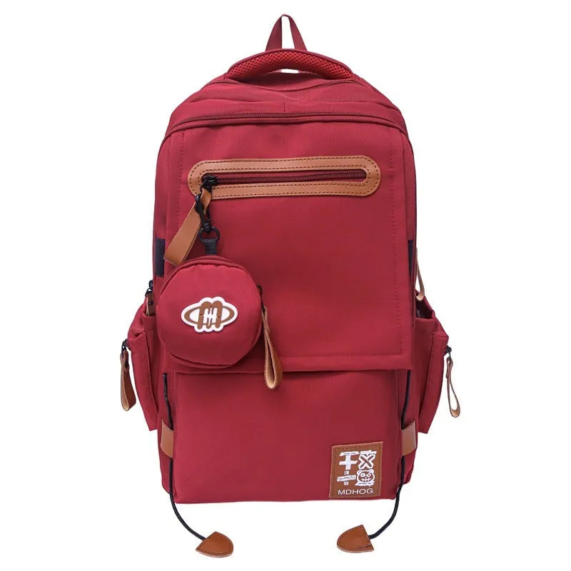 Waterproof nylon travel backpack with contrast stitching in five colour options