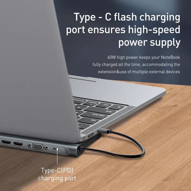 Grey aluminium ten-port laptop docking station with cooling bracket showing HDMI, VGA and USB connections