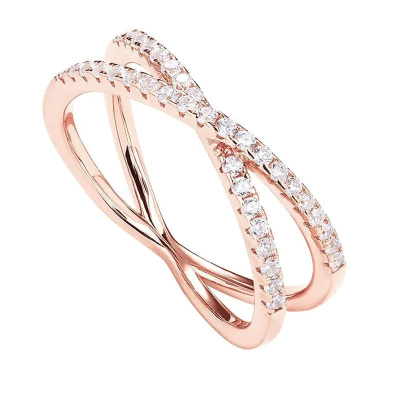 Silver cross ring with diamond-embedded half circle wide band in rose colour finish on white background
