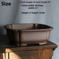 A rectangular purple sand clay bonsai pot on a floor, showing its modern simple design.