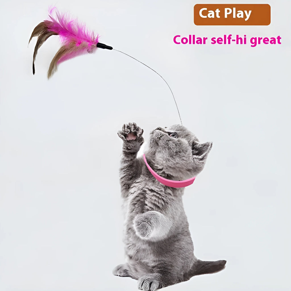 Pink and blue adjustable collar cat teaser toy with feather and bell attachment on a white background