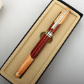 Fashion wooden and metal pen with a black carry bag on a desk