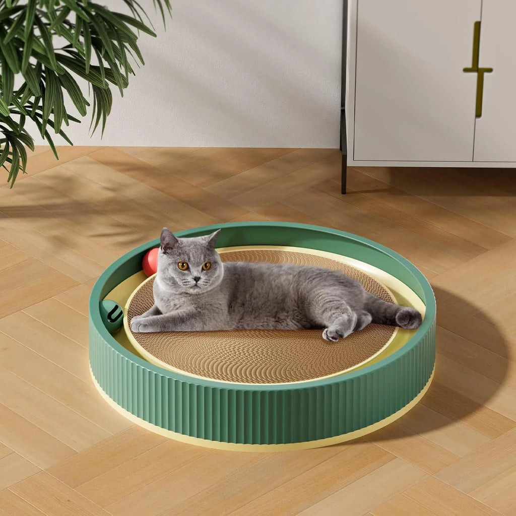 Large green cat scratching board with ball toys measuring 45cm diameter