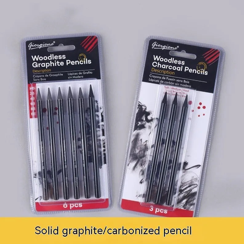 Set of six graphite and three carbonised art pencils in suction card packaging.