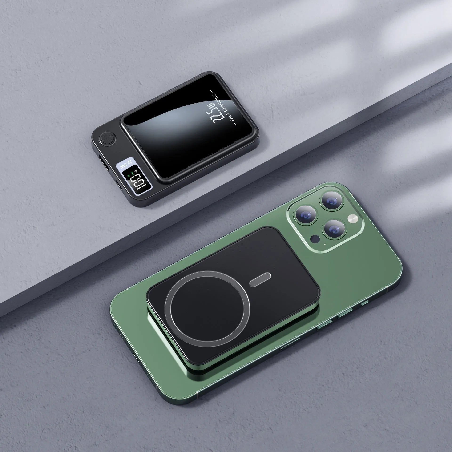 Wireless MagSafe power bank in black, showing industrial style plastic shell and compact rectangular shape.
