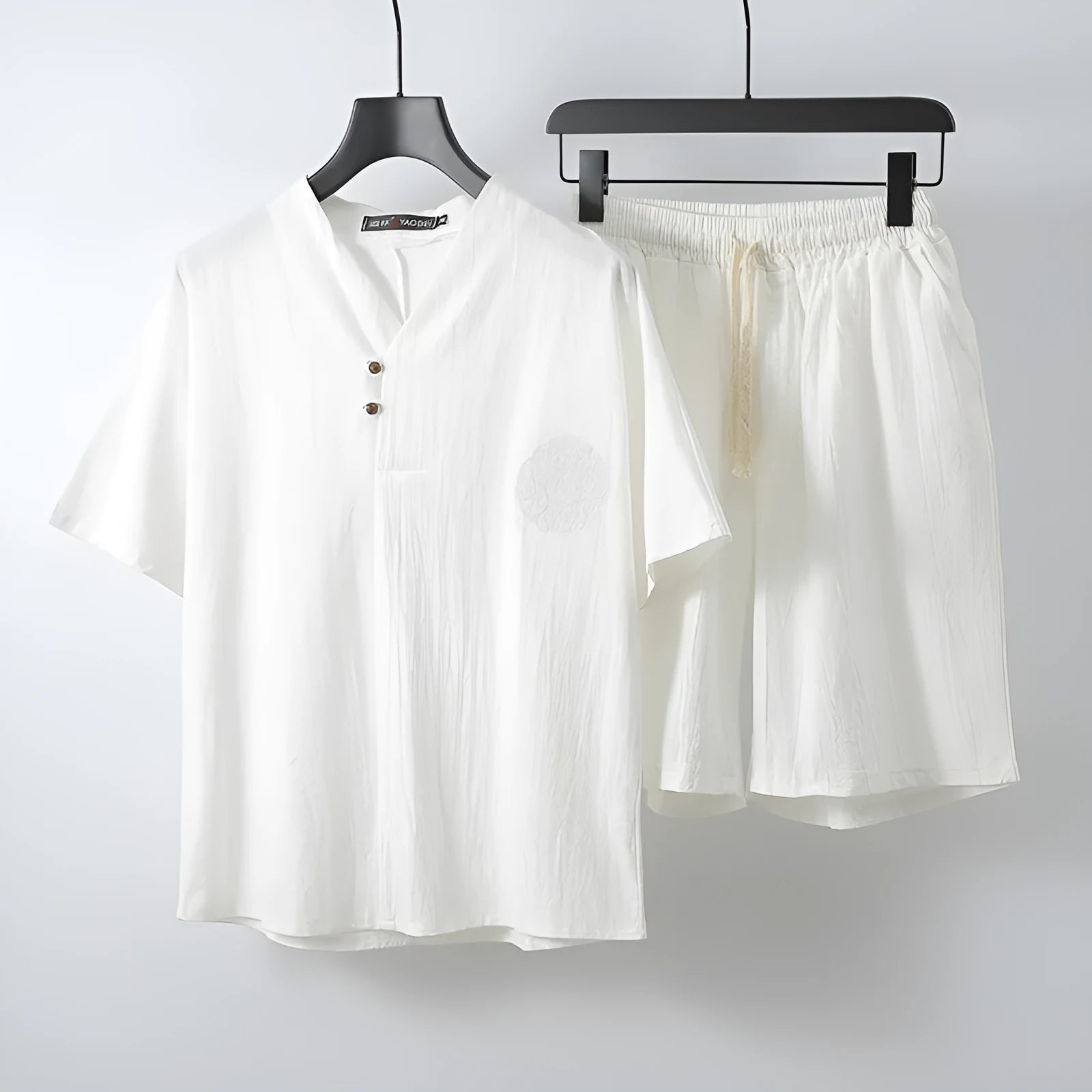 Men's loose linen cotton two-piece set with short-sleeved top and shorts in apricot colour.