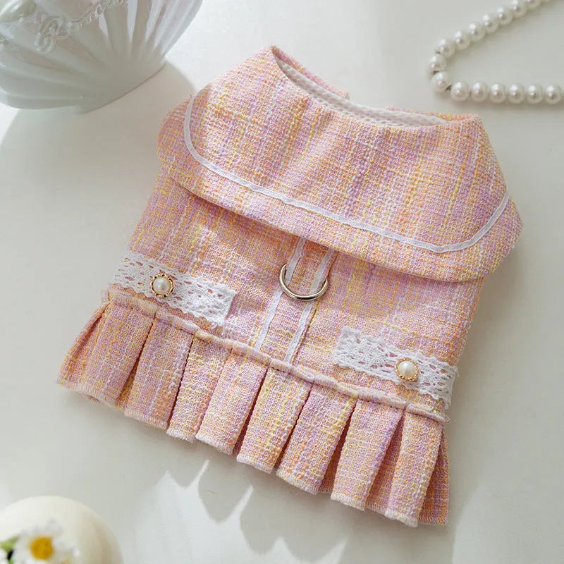 A pink V-neck sweater for a small dog or cat, shown alongside a purple colour option.