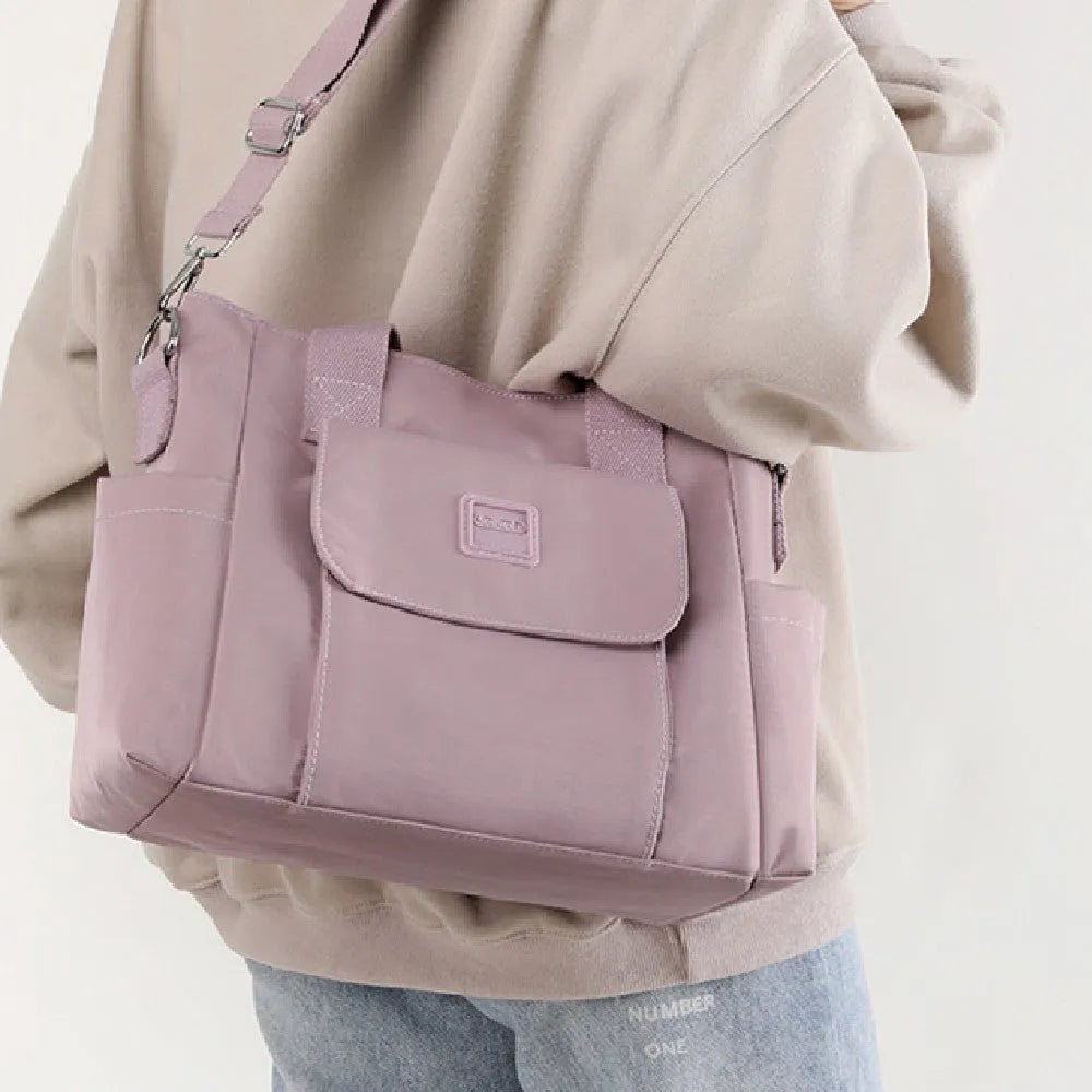 Women's large capacity multi-interlayer shoulder bag in nylon, soft horizontal square shape with sewing line detail, multiple internal compartments, urban simplicity style