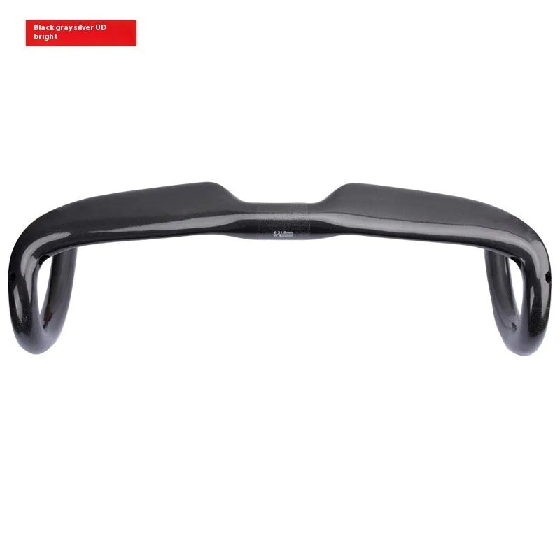 Carbon fibre road bicycle drop handlebar showing UD weave in black, grey, and silver.