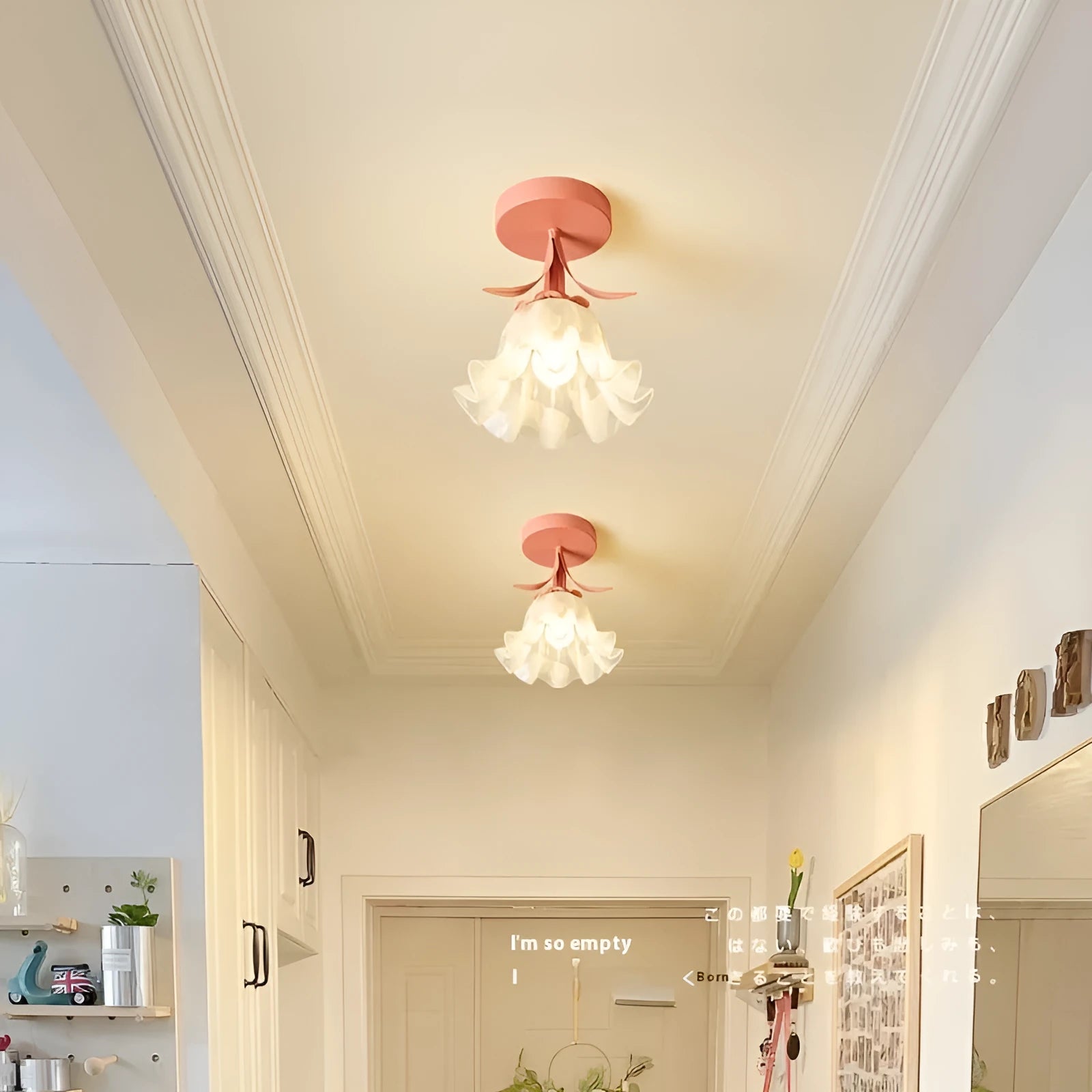 Cream coloured Linglan flower inspired corridor wall light with modern simple design on a white background.
