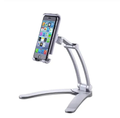 Silver aluminium desktop tablet stand holding a tablet, showing its 360-degree adjustable head and mounting base.