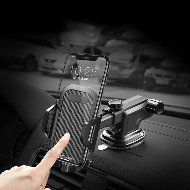 Black adjustable car phone holder with clamp for 4-7 inch smartphones on a car dashboard.