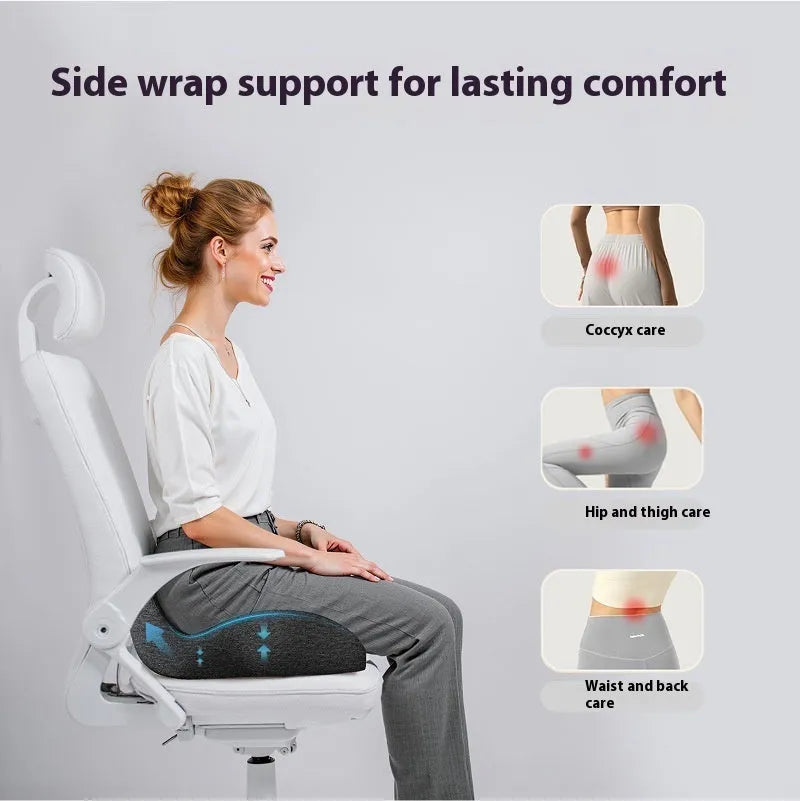 Grey memory foam office chair cushion measuring 46x43x12cm on a chair.