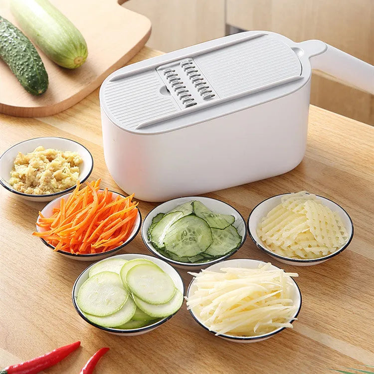 Nordic style manual vegetable slicer with stainless steel blades in blue, grey, and khaki colour options.