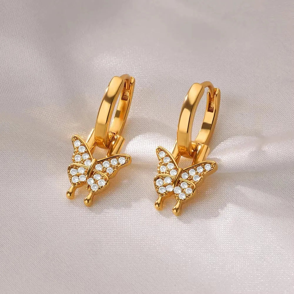 Women's geometric butterfly earrings with diamond treatment in copper with heart and star shapes