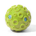 Durable rubber dog chew ball in multiple colours with squeaky sound and teeth-cleaning bumps.
