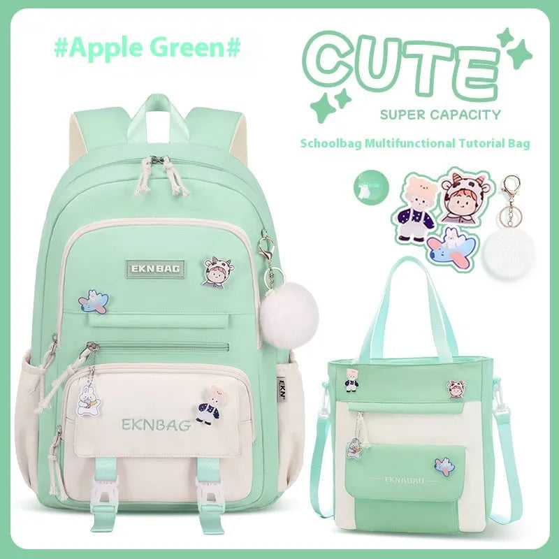 Pink waterproof Oxford cloth school backpack for girls with curved shoulder straps.