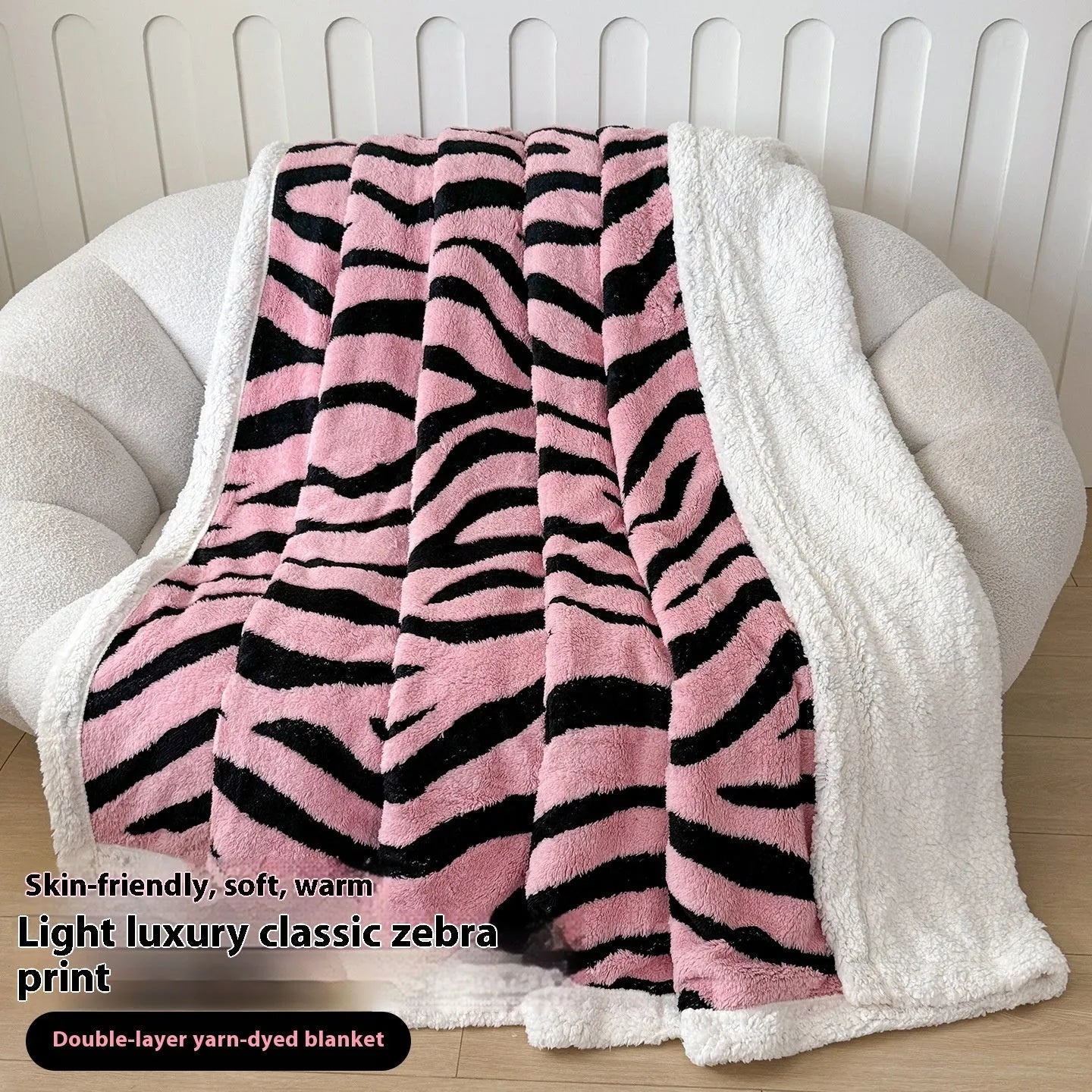 Double-layer cationic leopard jacquard taffeta blanket showing reversible design with zebra pattern