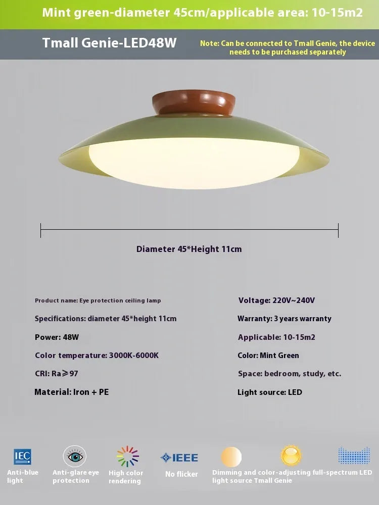 Modern cream style flying saucer shaped ceiling lamp in an iron shade.
