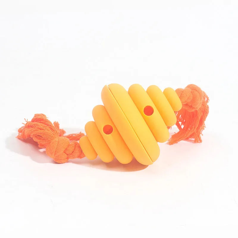Green rope and ball dog toy with treat dispensing hole for large breeds