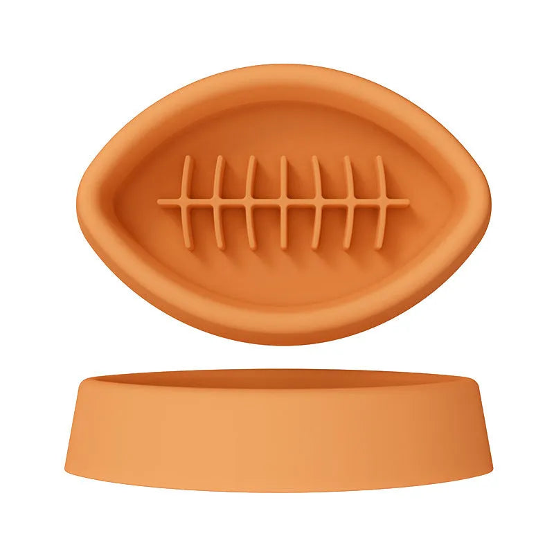 Blue silicone slow feeder pet bowl with suction cup base and internal maze pattern.